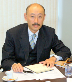 尾崎英之部会長